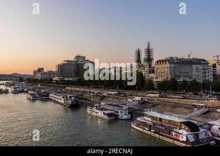 BUDAPEST, HUNGARY - AUGUST 14, 2019: Boats on Danube river in Budapest, Hungary Stock Photo