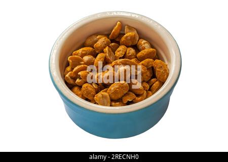 Bowl of Dry Roasted Peanuts isolated on white background Stock Photo