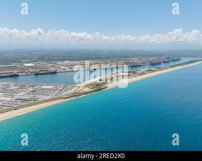 Commercial seaport with cargo ship Stock Photo