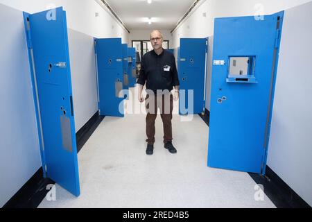 Stuttgart, Germany. 25th July, 2023. The Medical Director of the Calw Clinic for Forensic Psychiatry and Psychotherapy, Matthias Wagner, stands in a cell of the ex-prison 'Fauler Pelz' in Heidelberg's old town. For years, the city of Heidelberg and the state have fought over the use of the Fauler Pelz - now, in August, a rehab facility for addicted offenders is to open there in a prime Old Town location. Credit: Marijan Murat/dpa/Alamy Live News Stock Photo