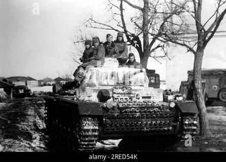 German tank with eaten soldiers in winter. It is painted with a white lime paint. Photo: Schneider [automated translation] Stock Photo