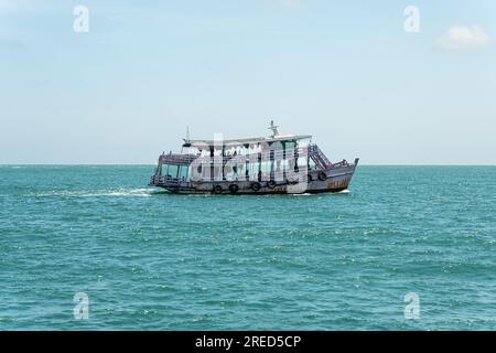 Fishing boat is out fishing. Fishermen is a career that has been popular in the seaside city of Thailand. Stock Photo