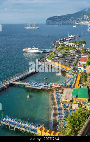 View looking down on Sorrento harbour and bathing area from viewpoint at Villa Comunale garden in Sorrento in the Campania Region of Southwest Italy Stock Photo