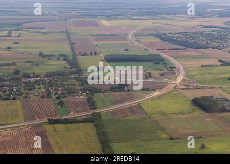 Aerial view of M4 motorway construction site and Peteri village east of Budapest, Hungary Stock Photo