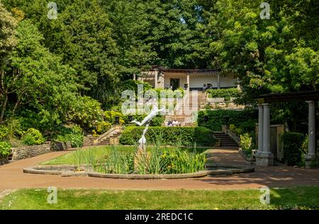 People tourists visitors relaxing in South Cliff Italian Gardens in summer Scarborough North Yorkshire England UK United Kingdom GB Great Britain Stock Photo