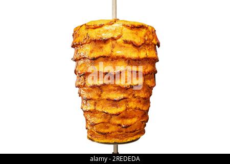 Grilled skewered chicken on spit, a traditional meat shaved, served inside kebab sandwich in Mediterranean and Arab countries in Middle East, cooked i Stock Photo