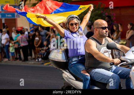 FARO, PORTUGAL - 24th JULY, 2023: Parade of several motorcyclists on the road for the 41st International Motorcycle Festival as a goodbye for the next Stock Photo