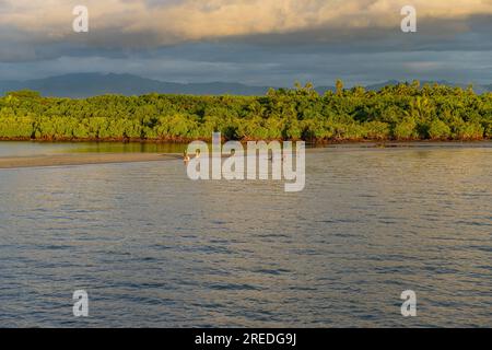 Viti Levu, Fiji: 29 May 2023: People fishing in the mangroves, Port Denarau, near Nadi, Viti Levu, Fiji Islands, South Pacific Stock Photo