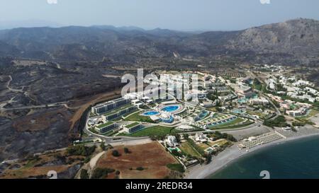 Tourist resorts near the town of Lardos on the Greek island of Rhodes, where the fire stopped just short of the walls of the complexes, Greece, July 2 Stock Photo