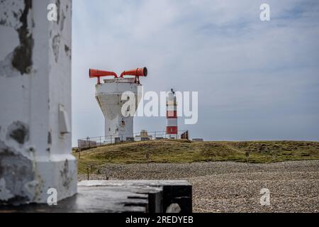 Red and white flaking paintwork on the Lighthouse and Foghorn at Point of Ayre on the Isle of Man Stock Photo