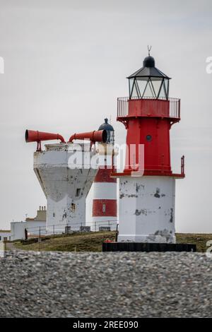 Red and white flaking paintwork on the Lighthouse and Foghorn at Point of Ayre on the Isle of Man Stock Photo