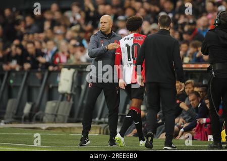 ROTTERDAM - (lr) Feyenoord coach Arne Slot, Calvin Stengs of Feyenoord during the friendly match between Feyenoord and Villareal CF at Feyenoord Stadion de Kuip on July 27, 2023 in Rotterdam, Netherlands. AP | Dutch Height | BART STOUTJESDYK Stock Photo