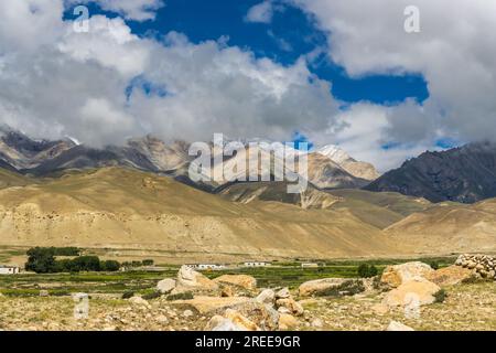 Desert Mountainous Landscape of Chosar Valley in Lo Manthang, Upper Mustang of Nepal Stock Photo