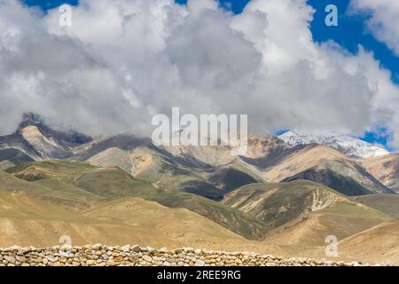 Desert Mountainous Landscape of Chosar Valley in Lo Manthang, Upper Mustang of Nepal Stock Photo