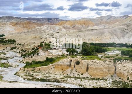 Desert Mountainous Landscape of Chosar Valley in Lo Manthang, Upper Mustang of Nepal Stock Photo