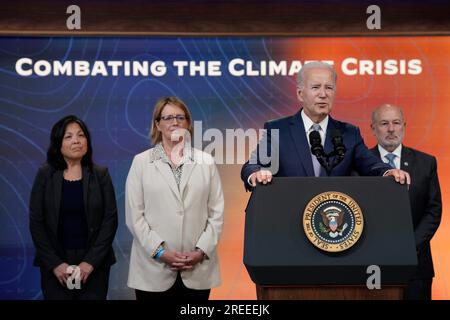 United States President Joe Biden announces additional actions to protect communities from extreme heat from the South Court Auditorium at the White House in Washington on July 27, 2023. Pictured behind the President from left: From left, Julie Su, Acting US Secretary of Labor, Federal Emergency Management Agency (FEMA) administrator Deanne Criswell, and Rick Spinrad, Administrator of the National Oceanic and Atmospheric Administration (NOAA). Credit: Yuri Gripas/Pool via CNP Stock Photo