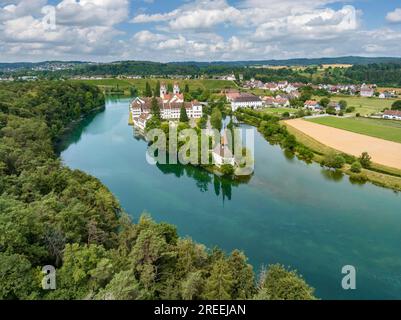 Aerial view of the former Benedictine abbey with the monastery church of St. Mary and the pointed church of St. Magdalena on the Rhine island of Stock Photo
