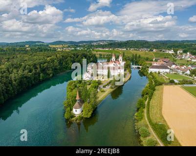 Aerial view of the former Benedictine abbey with the monastery church of St. Mary and the pointed church of St. Magdalena on the Rhine island of Stock Photo