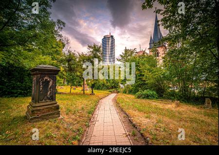 View of the Jentower on the left and the Catholic Church of St. John Baptist on the right from the Johannisfriedhof, Jena, Thuringia, Germany Stock Photo