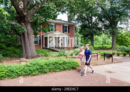 Athens Georgia,University of Georgia school campus,North Campus Quad,Lustrat House,Office of Legal Affairs,mother son walking,teen teenage teenager re Stock Photo