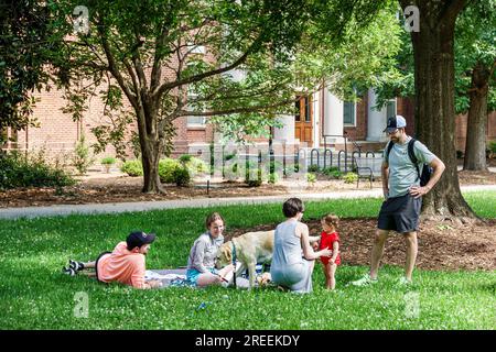 Athens Georgia,University of Georgia school campus,North Campus Quad,family parents father mother daughter,pet dog Stock Photo