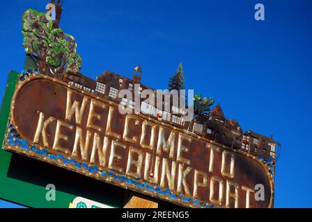 A sign depicted a miniature version of the town welcomes visitors to Kennebunkport Maine Stock Photo