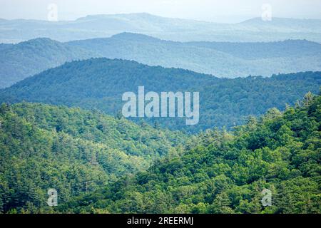 Sky Valley Georgia,Blue Valley Overlook Nantahala National Forest,panoramic view distant tree covered ridges,Appalachian Blue Ridge Mountains Stock Photo