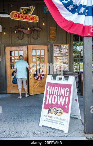 Flat Rock North Carolina,Cracker Barrel Old Country Store restaurant,banner sign now hiring help wanted,equal opportunity employer,outside exterior,bu Stock Photo