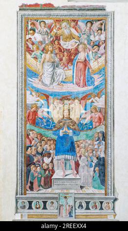 Saint Sebastian as intercessor, San Sebastiano con devoti, fresco by Benozzo Gozzoli, Chiesa di Sant'Agostino, San Gimignano, Province of Siena Stock Photo