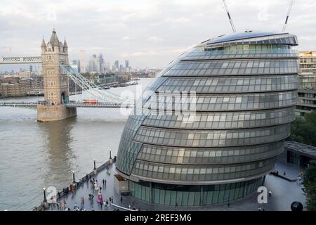 London UK, 27th July 2023. UK Weather. Cloudy sky over London Tower bridge looking from London City Hall toward Canary Wharf in Isle of Dogs, UK Credit: Xiu Bao/Alamy Live News Stock Photo