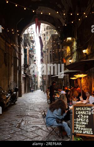 Naples, Italy - April 19 2022: Typical arched street and architectural view in Naples, Campania, Italy. Stock Photo