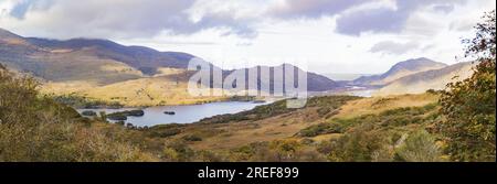 Panorama picture of Muckross lake from Ladies view in Killarney National Park during daytime Stock Photo