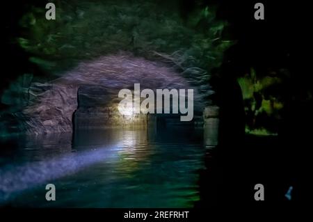 Kayaking a abandoned silica mine that is flooded with water. Stock Photo