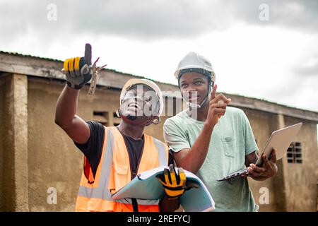 two african engineers discussing something Stock Photo