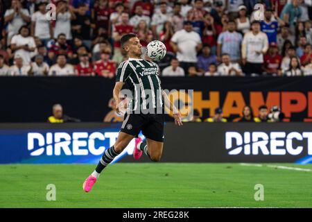 Manchester United defender Diogo Dalot (20) gains possession during the Soccer Champions Tour against Real Madrid, Wednesday, July 26, 2023, at NRG St Stock Photo