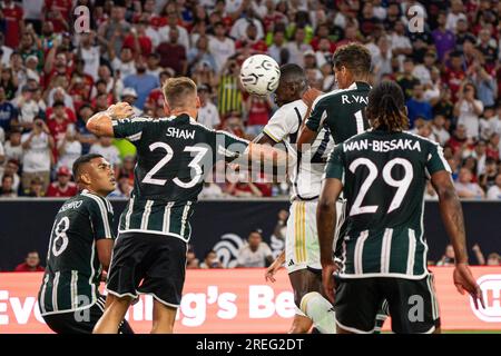 Real Madrid defender Ferland Mendy (23) heads a corner kick towards goal against Manchester United defender Luke Shaw (23) during the Soccer Champions Stock Photo