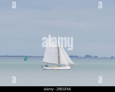 Sheerness, Kent, UK. 28th July, 2023. UK Weather: an overcast sky with some sunny spells in Sheerness, Kent. Pic: yacht Rosebud. Credit: James Bell/Alamy Live News Stock Photo