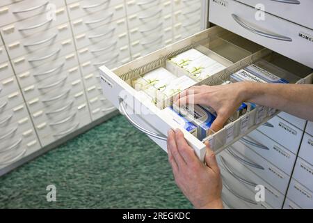 Berlin, Germany. 24th July, 2023. Medicines stored in a drawer in a pharmacy. Credit: Jens Kalaene/dpa/Alamy Live News Stock Photo