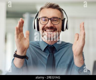 Portrait, business and man applause on video call, smile and headphones at home. Happy face, clapping and webinar of mature manager with glasses in Stock Photo