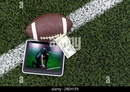 American football app video game on smartphone.. Mobile phone and american football ball and helmet isolated on white. 3d illustration Stock Photo