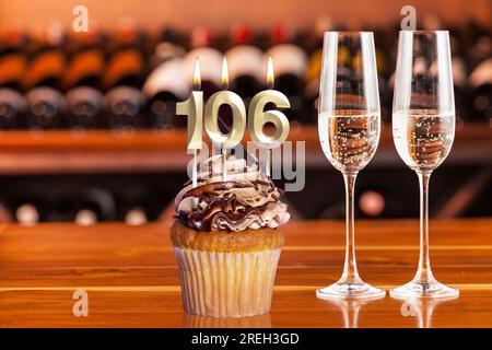 Cupcake With Number For Celebration Of Birthday Or Anniversary; Number 106. Stock Photo