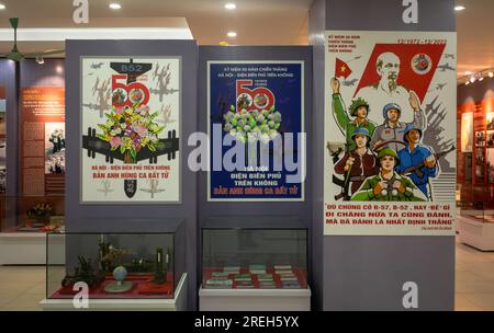 Three Vietnamese communist propaganda posters marking the 50th anniversary of the Christmas bombing of Hanoi by the US on display in the Air Force Mus Stock Photo