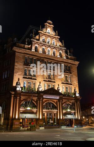 Waldorf Astoria Edinburgh - The Caledonian luxury 5-star hotel at night in Edinburgh, Scotland, UK. Historic building from 1903, built as part of Edin Stock Photo