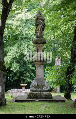 Horni Paseka, Czech Republic. 12th June, 2023. Statue of the Virgin Mary front of the Church of St. Vitus in flooded village Zahradka of which only a church and a cemetery remain on the hill (today on the bank of the Svihov dam) near the of Horni Paseka, June 12, 2023. In addition, Josef Toufar, the pastor (local priest) whom the communists tortured to death used to work in this church. Credit: Loskot Jaroslav/CTK Photo/Alamy Live News Stock Photo