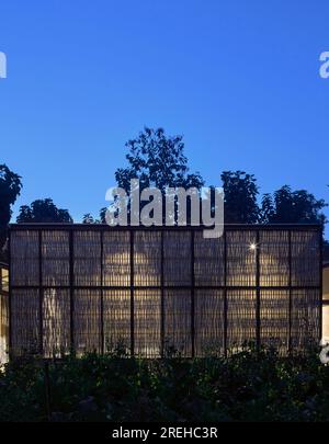 Studio Array Front view at dusk. Farm8, New Delhi, India. Architect: Studio array ...