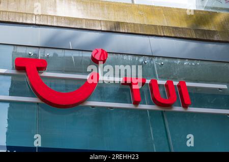 Large TUI sign and logo outside one of it's branches in Birmingham, UK Stock Photo