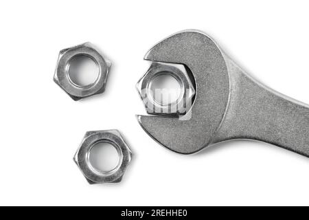 Close-up of wrenche and steel screw nuts on white background Stock Photo