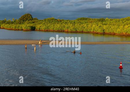 Viti Levu, Fiji: 29 May 2023: People fishing in the mangroves, Port Denarau, near Nadi, Viti Levu, Fiji Islands, South Pacific Stock Photo