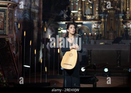 27 Jul 2023 Lute player Anna Wiktoria Swoboda performes baroque music in UNESCO wooden church in Binarowa during Kromer Festival Biecz - Poland Stock Photo