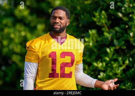 Washington Commanders quarterback Sam Howell (14) warms up prior to the  start of an NFL pre-season football game against the Cleveland Browns,  Friday, Aug. 11, 2023, in Cleveland. (AP Photo/Kirk Irwin Stock